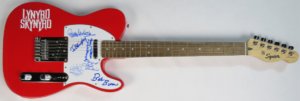 Lynyrd Skynyrd - RLC 12 Auction Signed Red Guitar